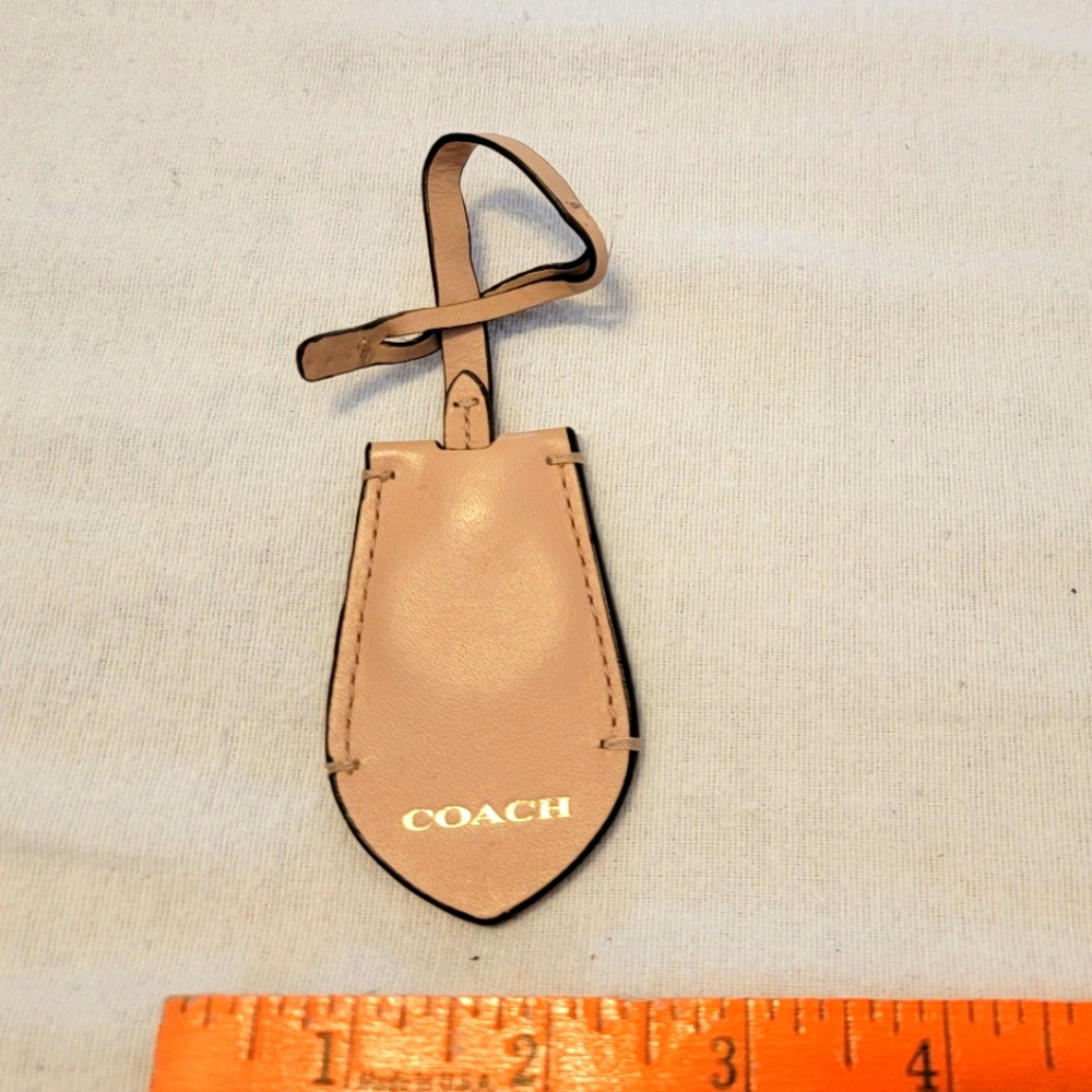 Peach Colored Coach Tag